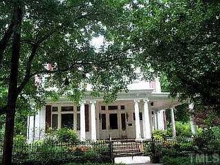 409 Polk Street Raleigh, NC 27604 - Photo 1 of 1 a front view of a house with a garden