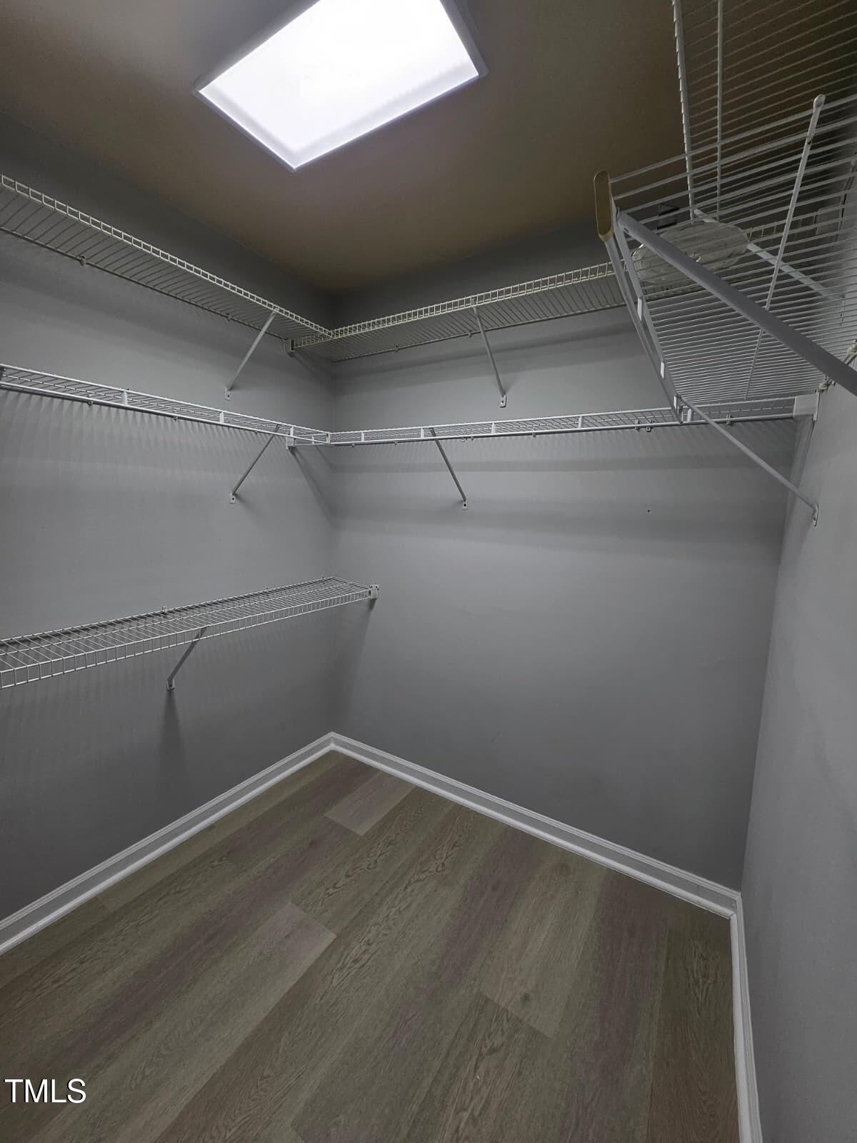 2205 Kirkhaven Road Morrisville, NC 27560 - Photo 15 of 36 a view of a room with racks on the wall