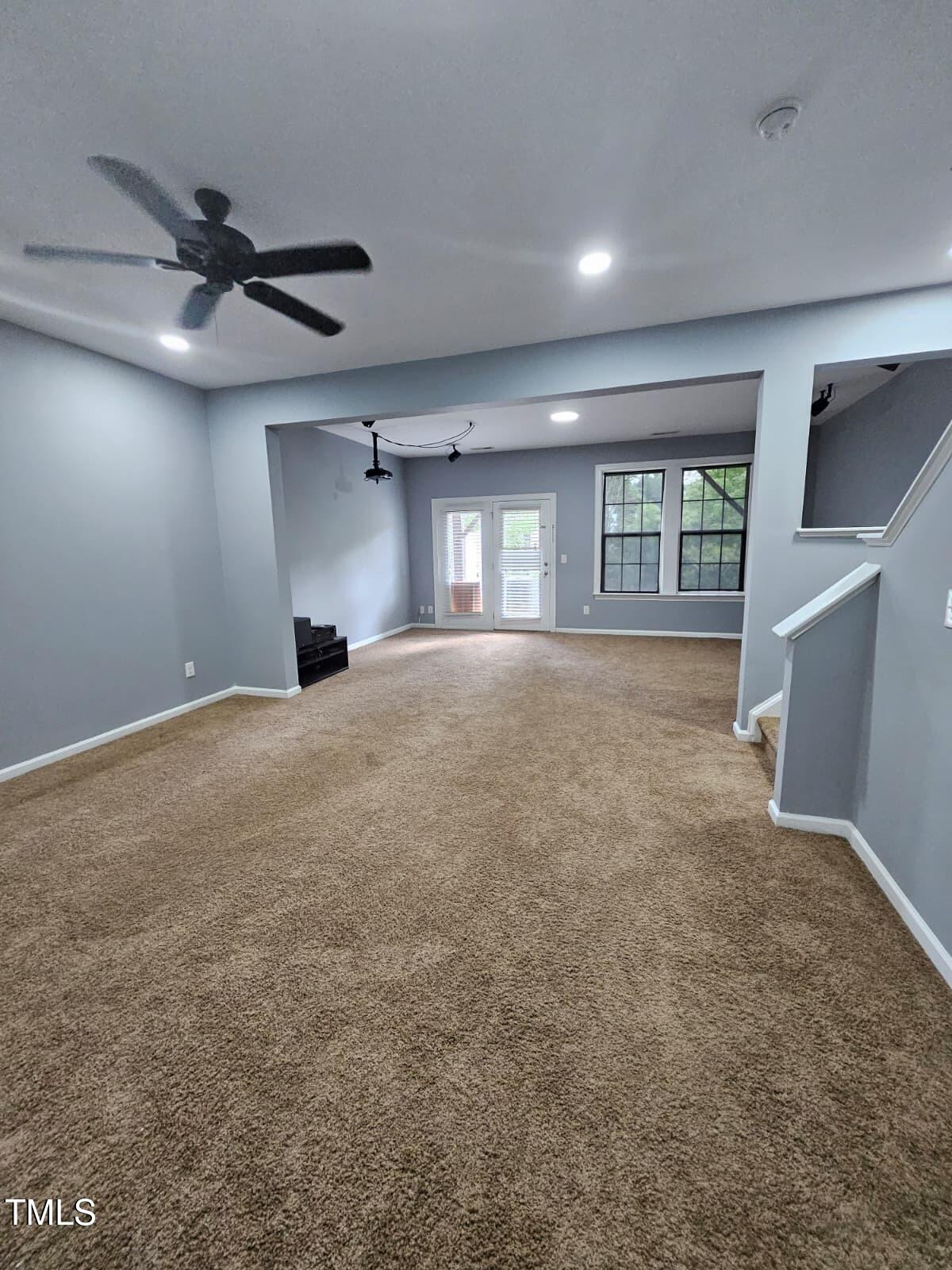 2205 Kirkhaven Road Morrisville, NC 27560 - Photo 22 of 36 a view of an empty room with a window and fireplace
