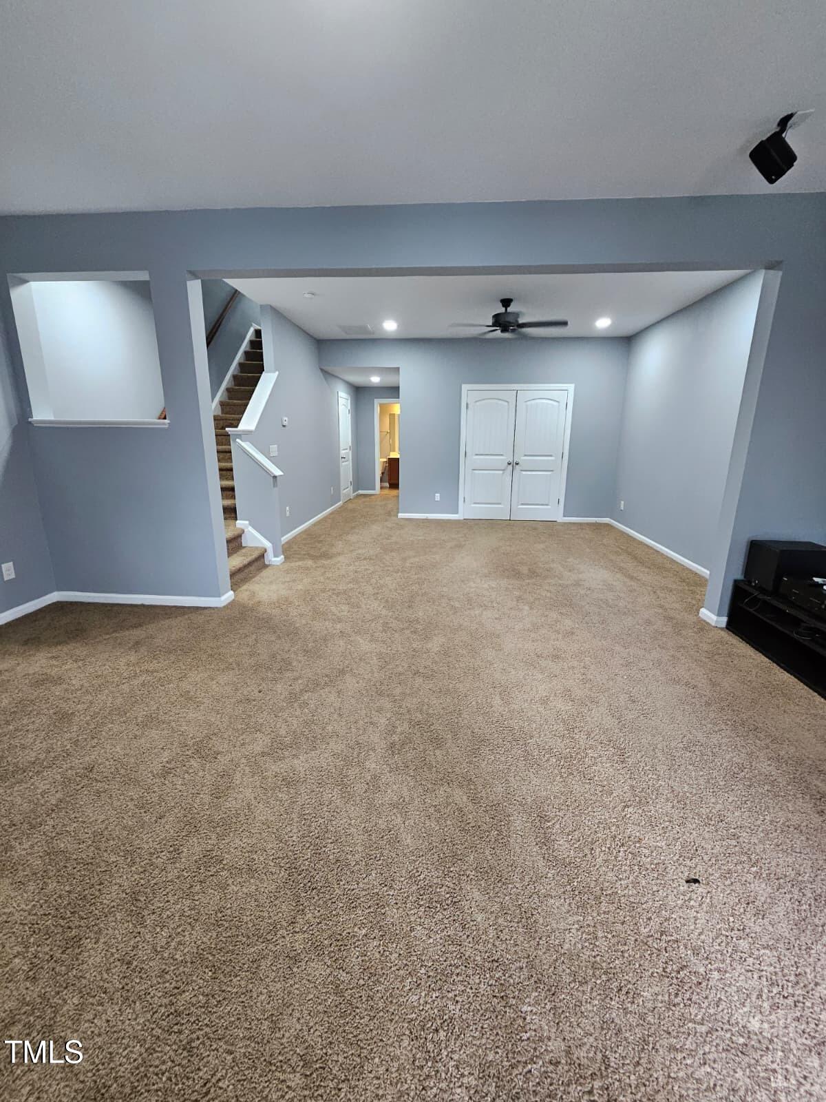 2205 Kirkhaven Road Morrisville, NC 27560 - Photo 23 of 36 a view of a livingroom with a staircase