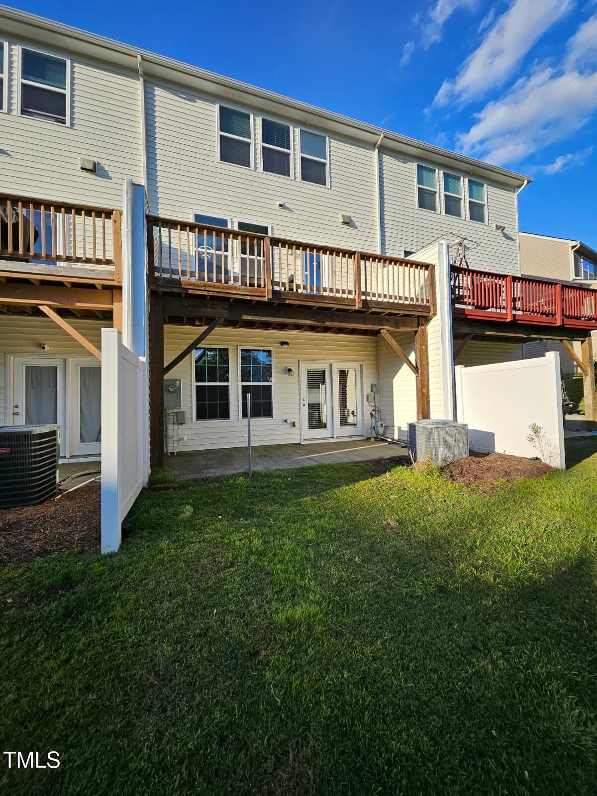 2205 Kirkhaven Road Morrisville, NC 27560 - Photo 28 of 36 a view of a house with a backyard