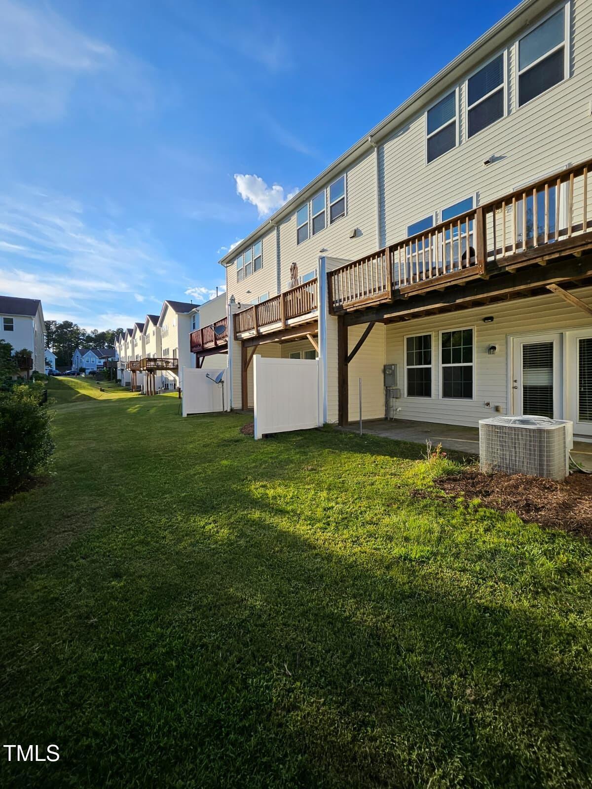 2205 Kirkhaven Road Morrisville, NC 27560 - Photo 30 of 36 a view of a house with a yard