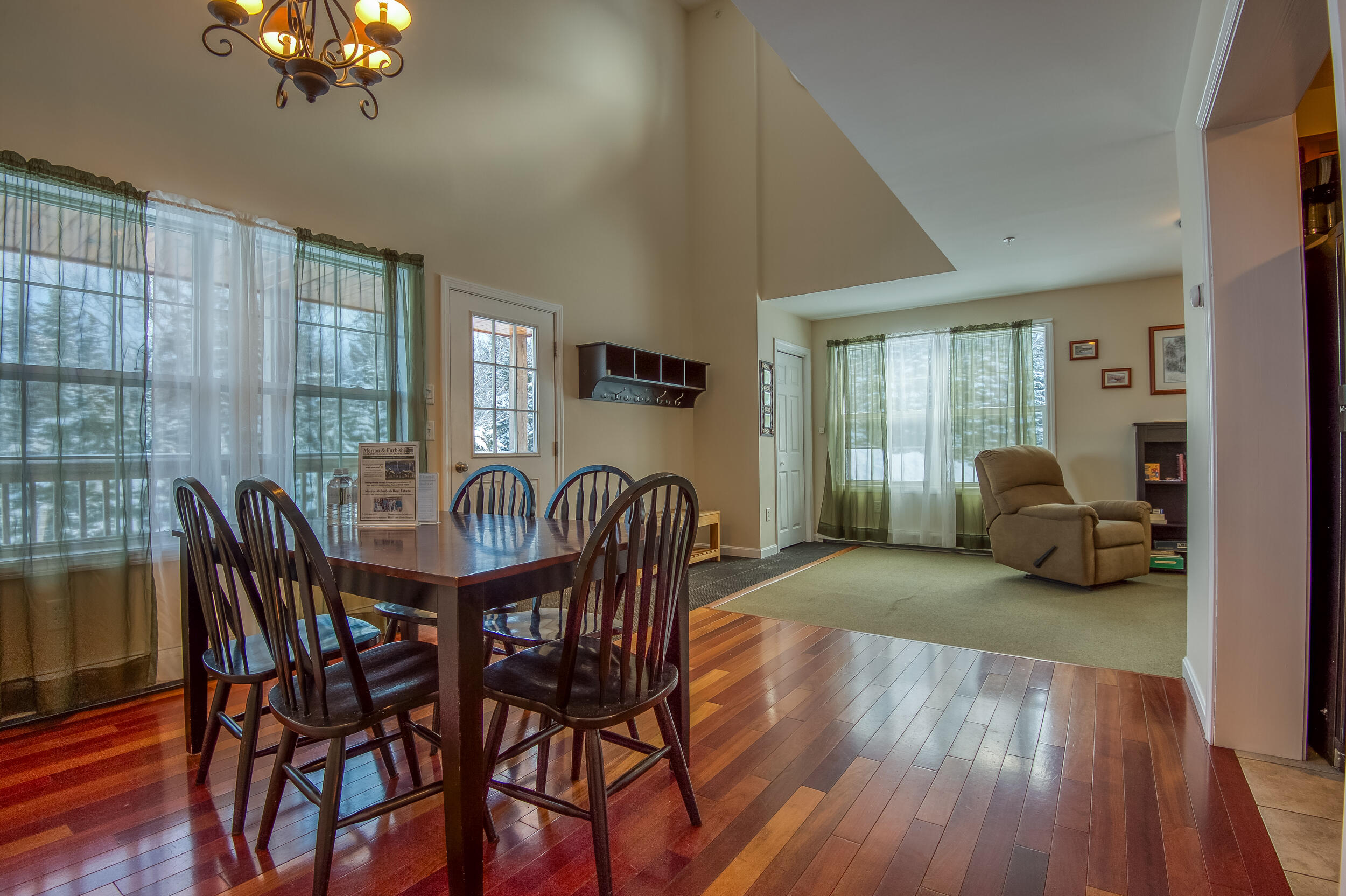 154 Cahill Lane, Unit 1083 Dallas Plt, ME 04970 - Photo 16 of 48 Dining into Living Room