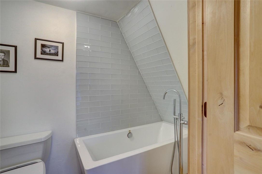 74 A Road Silverthorne, CO 80498 - Photo 16 of 34 Second bathroom on the main floor with its own tub