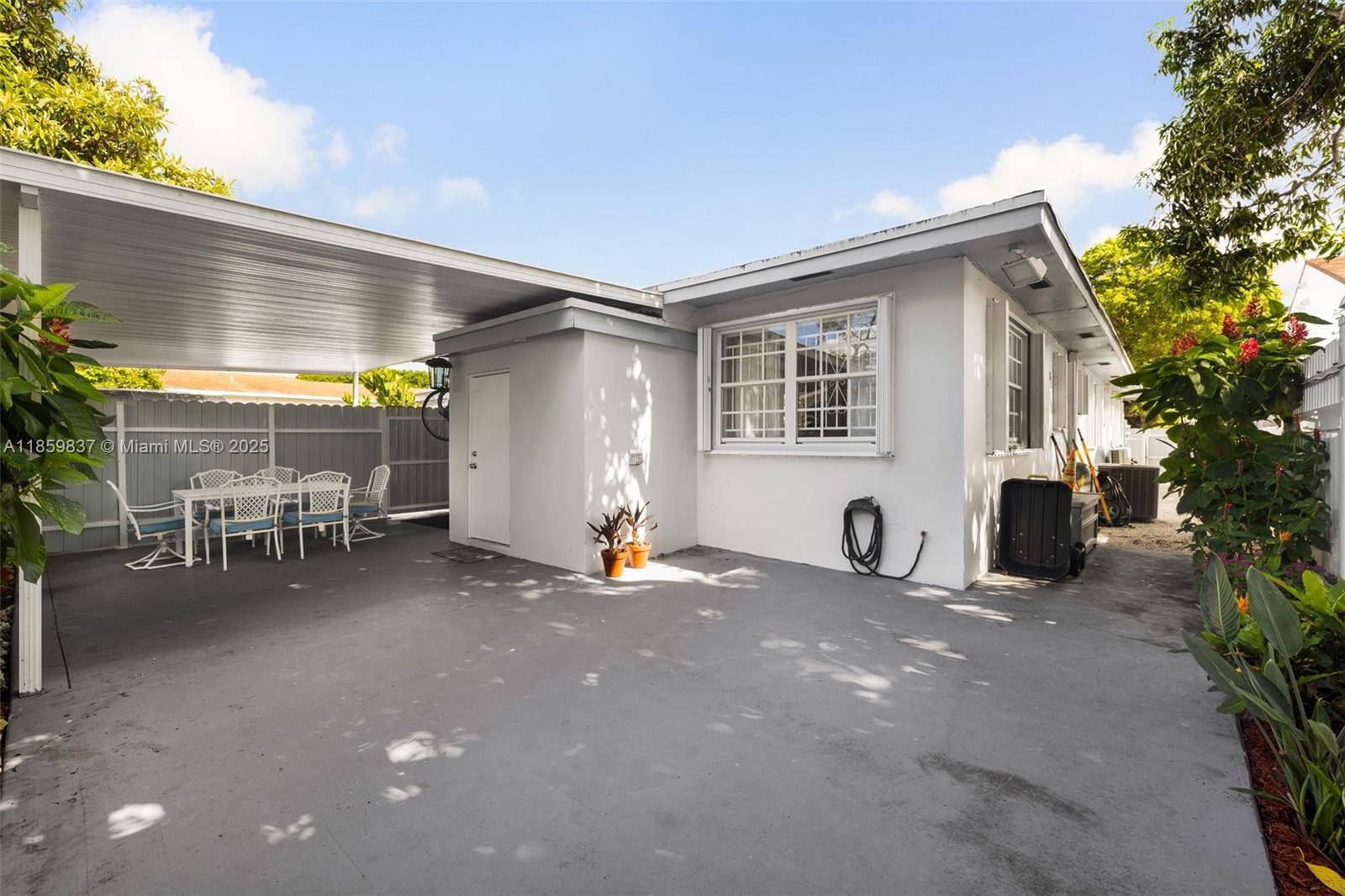 2928 Southwest 5th Street, Unit C Miami, FL 33135 - Photo 12 of 15 a view of a house with a patio