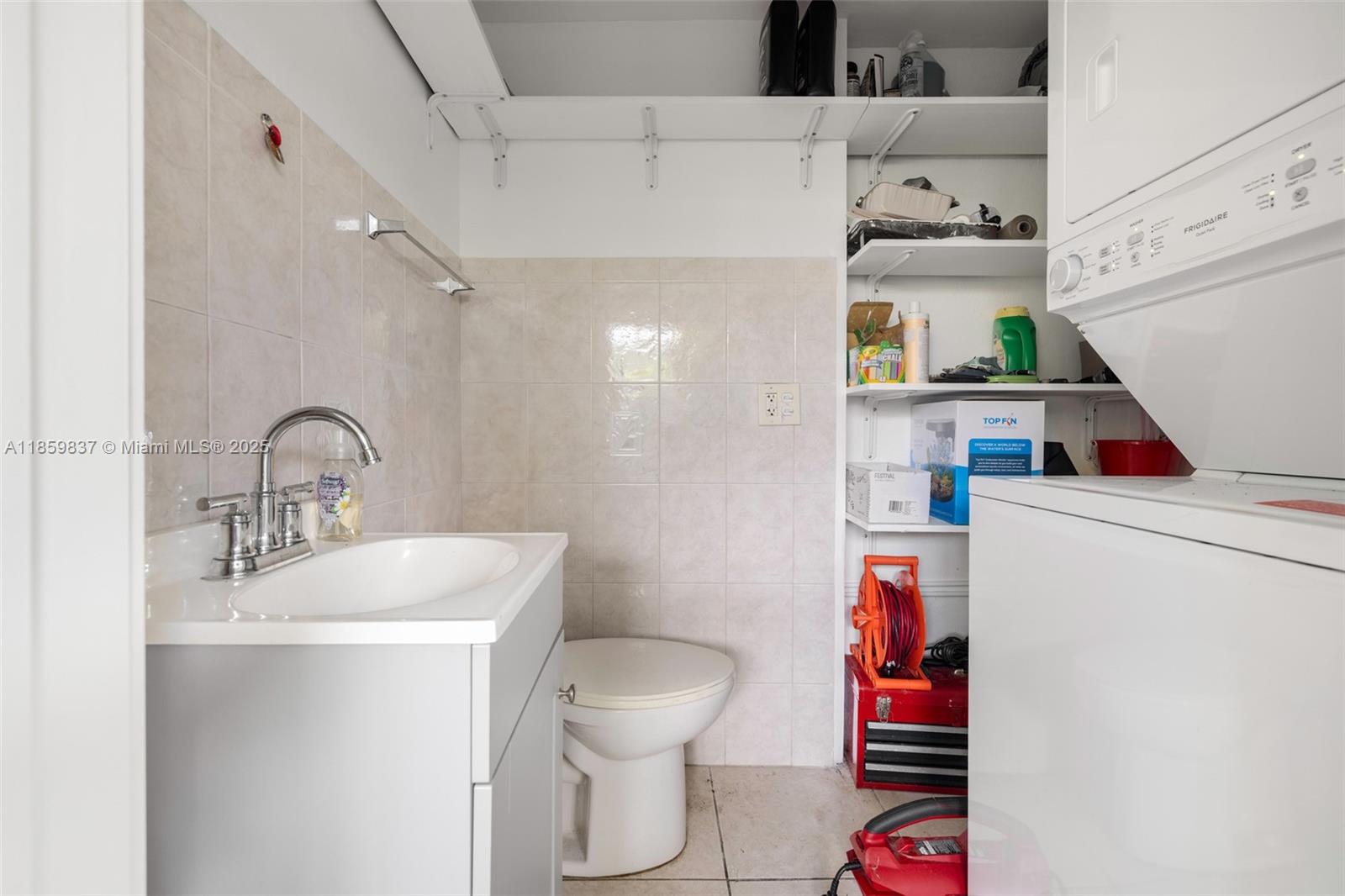 2928 Southwest 5th Street, Unit C Miami, FL 33135 - Photo 10 of 15 a bathroom with a sink toilet and a shower