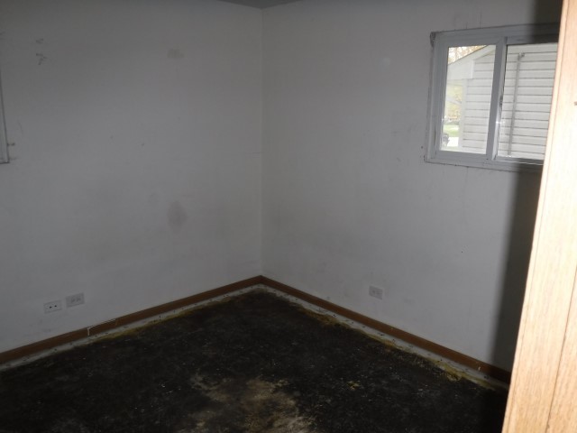 1131 146th Street Dolton, IL 60419 - Photo 14 of 15 an empty room with a window