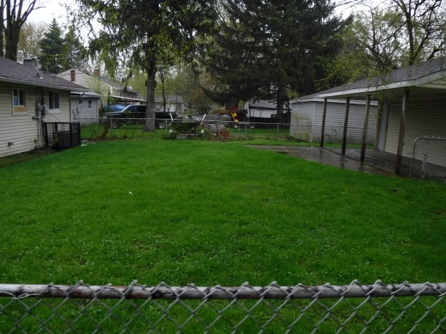1131 146th Street Dolton, IL 60419 - Photo 4 of 15 a view of a backyard with sitting area