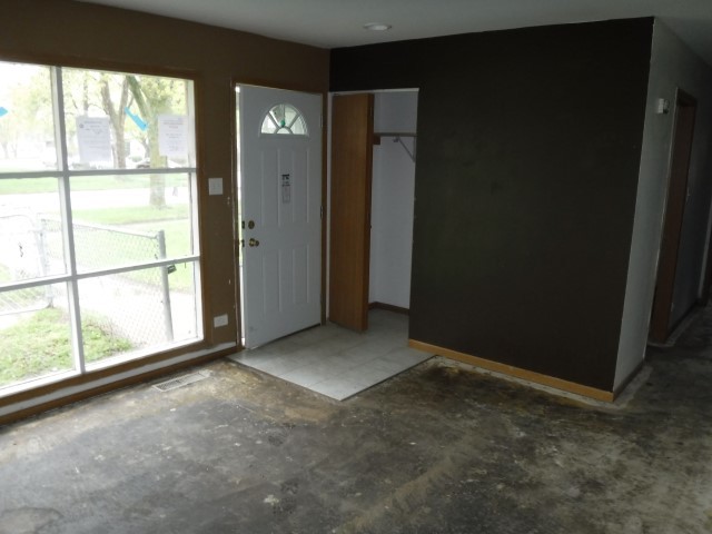 1131 146th Street Dolton, IL 60419 - Photo 7 of 15 an empty room with windows and closet