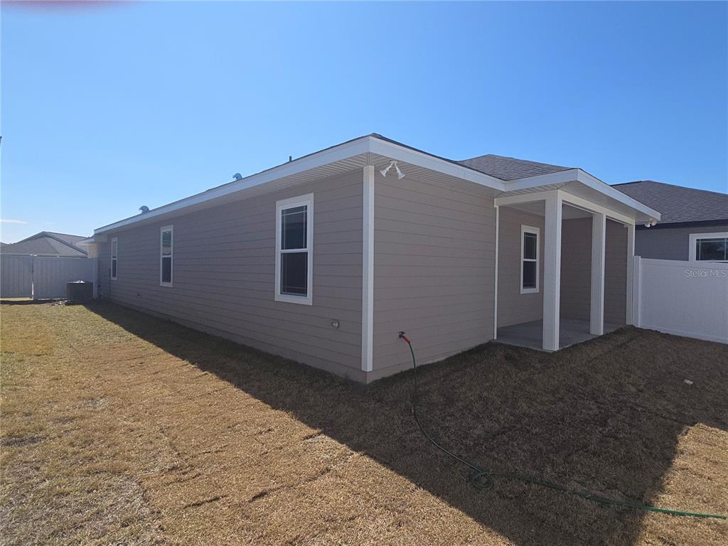24338 Southwest 18th Road Newberry, FL 32669 - Photo 13 of 20 a view of a house with a backyard