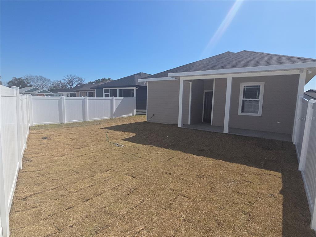 24338 Southwest 18th Road Newberry, FL 32669 - Photo 14 of 20 a view of a house with a yard