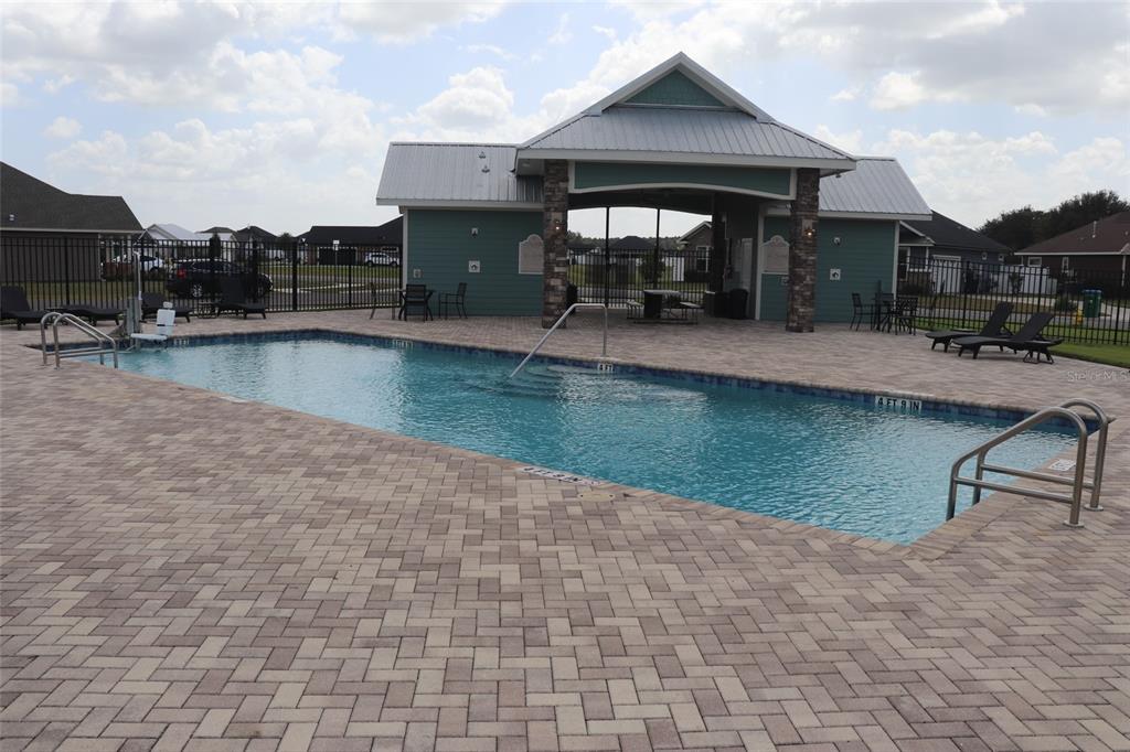 24338 Southwest 18th Road Newberry, FL 32669 - Photo 18 of 20 swimming pool view with a outdoor seating space