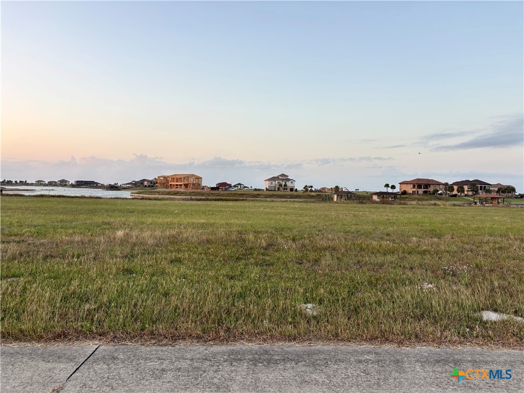 159 Chateau Way Port Port O'Connor, TX 77982 - Photo 22 of 40 a view of a lake with a city