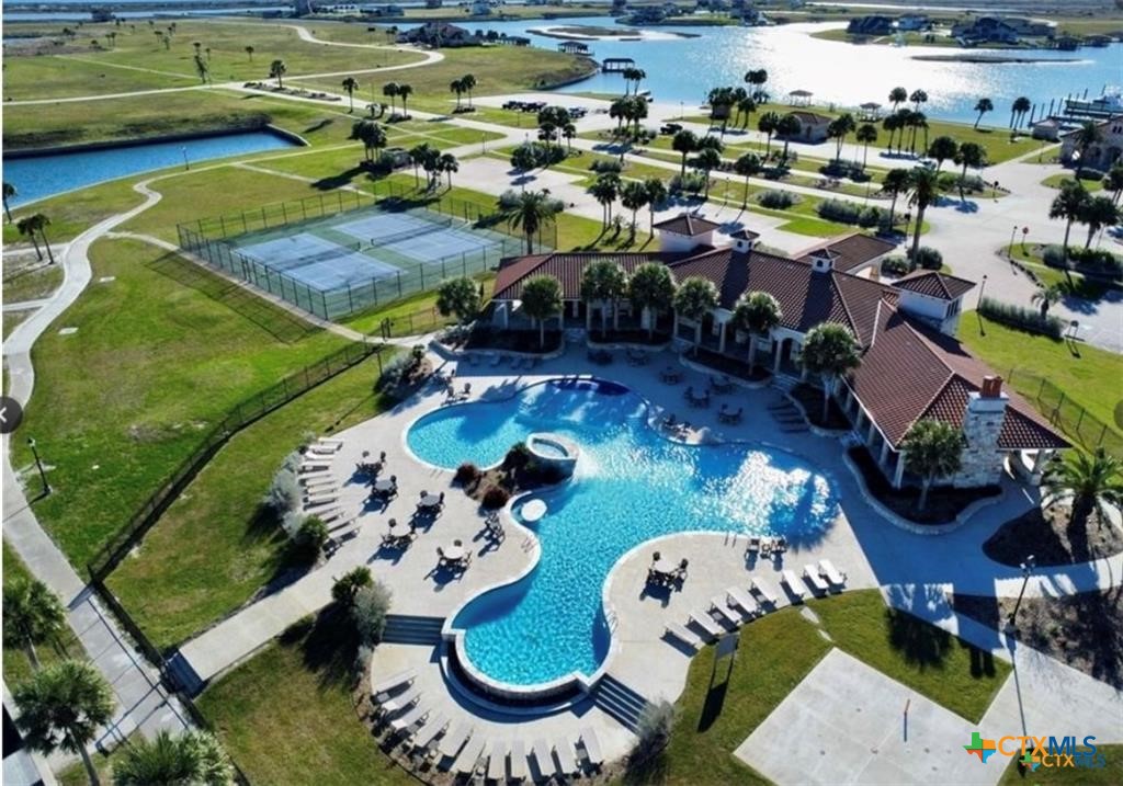 159 Chateau Way Port Port O'Connor, TX 77982 - Photo 34 of 40 an aerial view of a house with swimming pool patio and outdoor seating