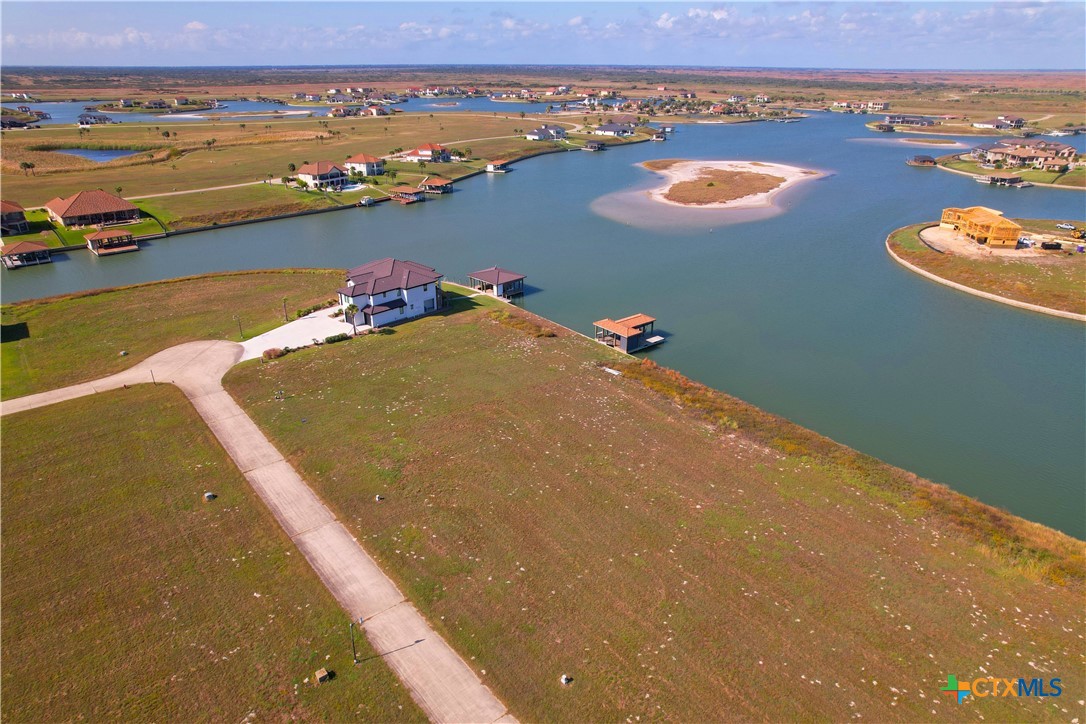 159 Chateau Way Port Port O'Connor, TX 77982 - Photo 40 of 40 an aerial view of residential houses with outdoor space