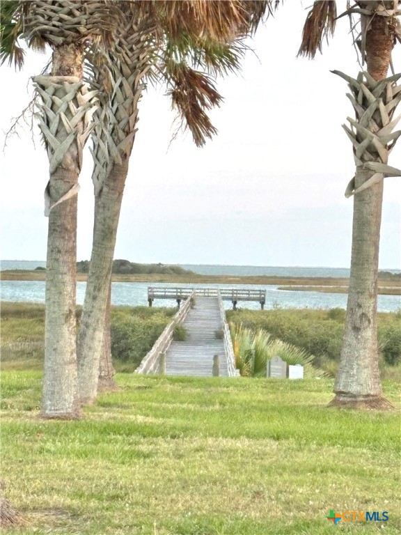 159 Chateau Way Port Port O'Connor, TX 77982 - Photo 8 of 40 a view of a lake from a yard with an ocean view