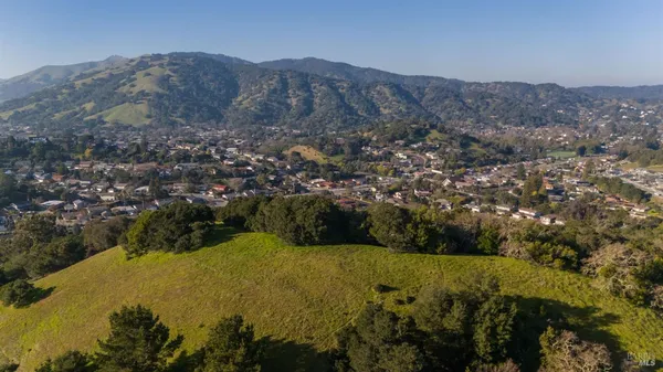 a view of lake and mountain