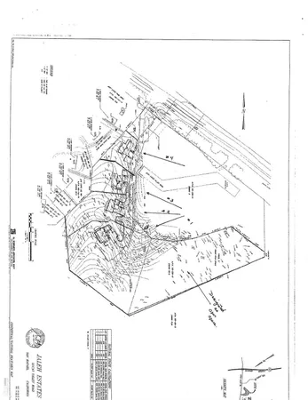 a aerial view of a residential apartment building and trees
