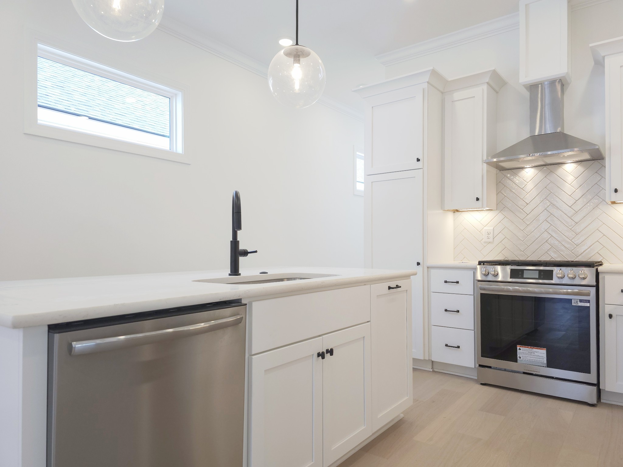 7147 Frances Street Fairview, TN 37062 - Photo 15 of 45 a kitchen with a sink stainless steel appliances and cabinets