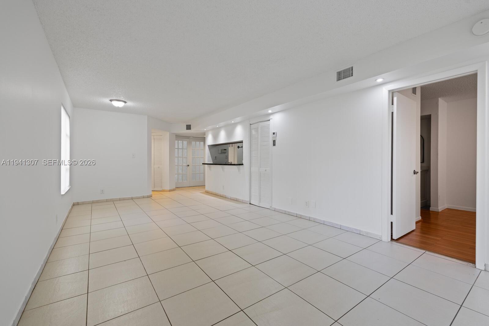 9500 Southwest 140th Court, Unit 9500 Miami, FL 33186 - Photo 7 of 21 a view of empty room