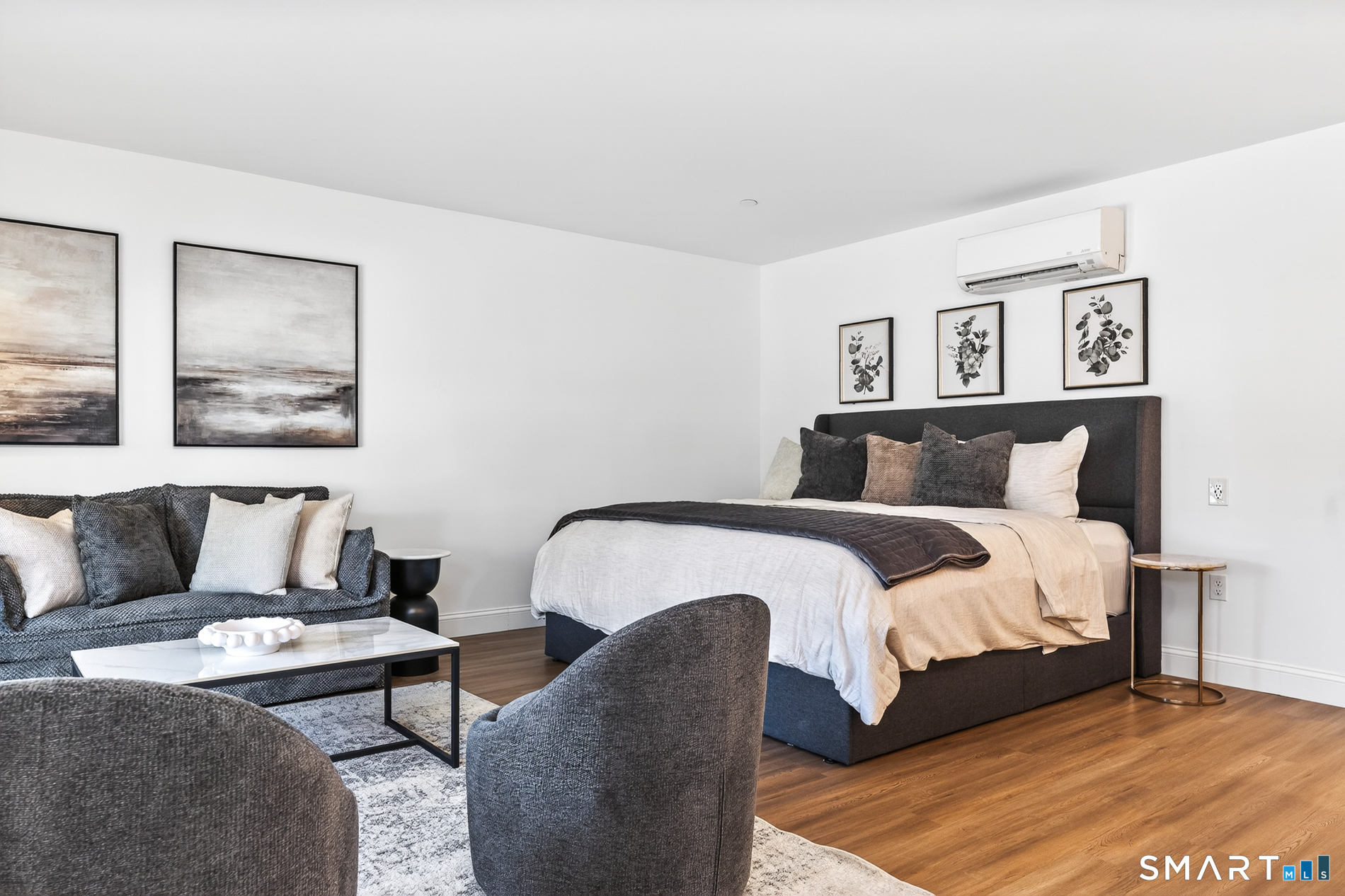 44 Williams Avenue Stonington, CT 06355 - Photo 17 of 39 a bedroom with a bed and a couch