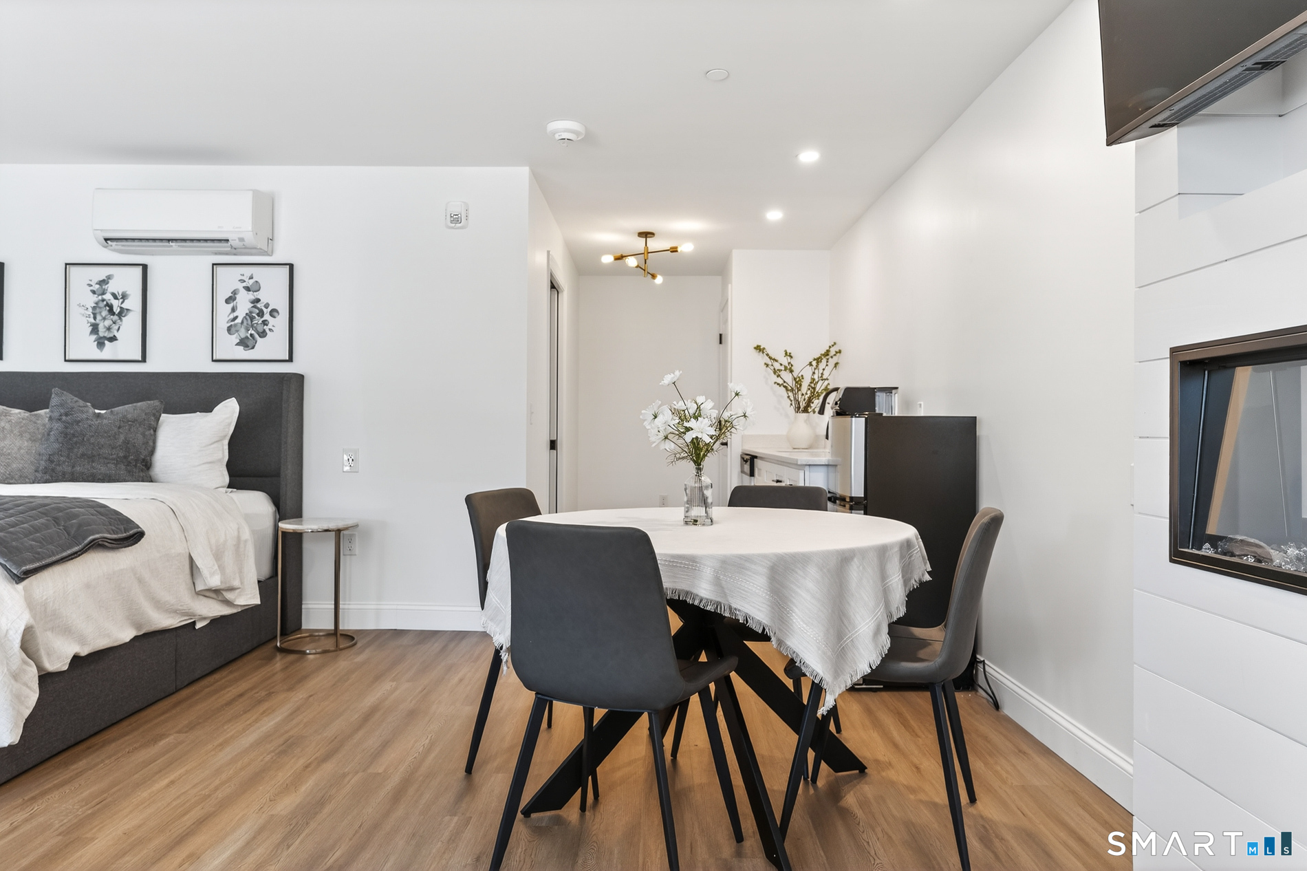 44 Williams Avenue Stonington, CT 06355 - Photo 19 of 39 a view of a dining room with furniture and wooden floor