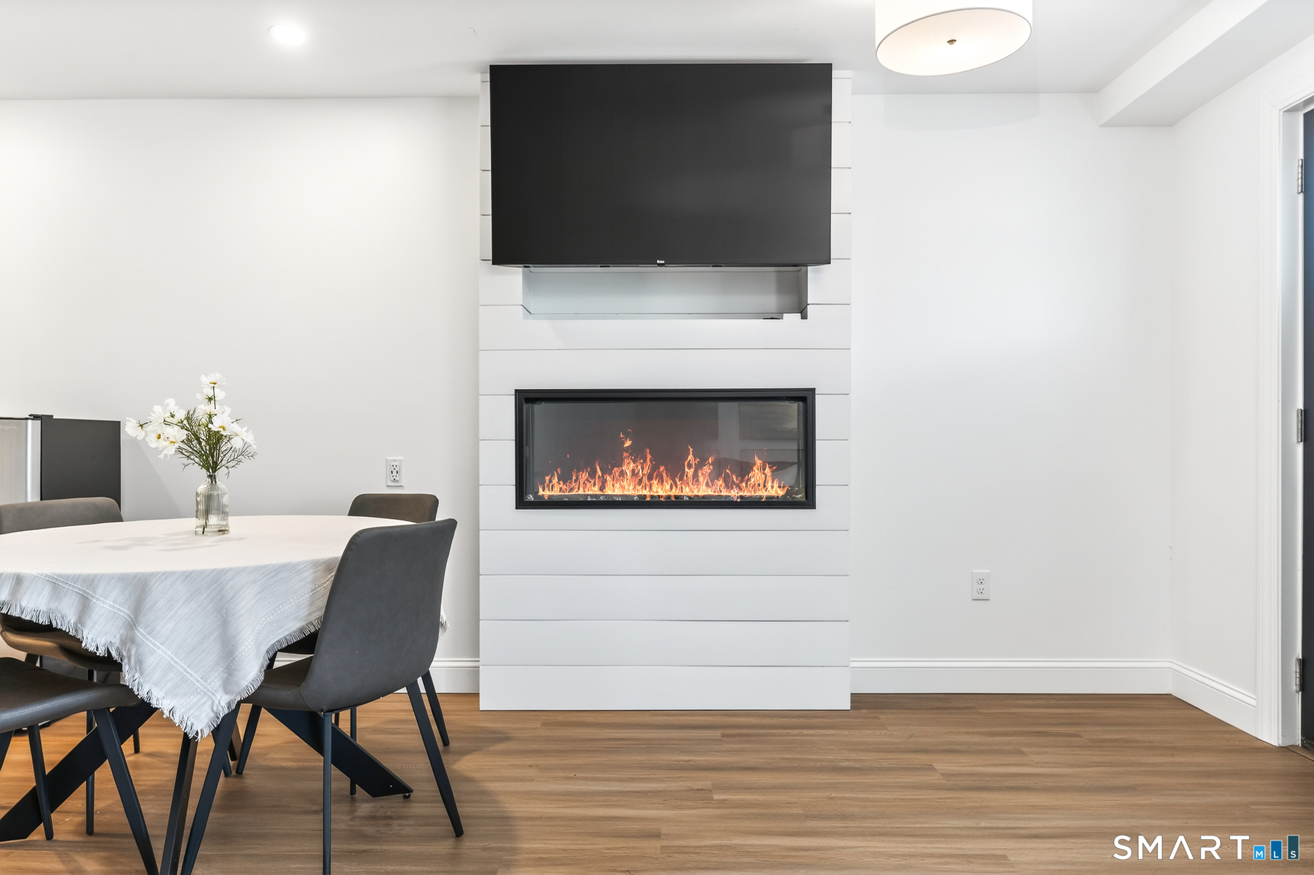 44 Williams Avenue Stonington, CT 06355 - Photo 20 of 39 a living room with furniture and a fireplace