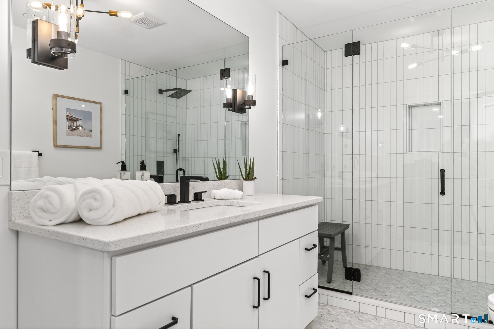 44 Williams Avenue Stonington, CT 06355 - Photo 24 of 39 a bathroom with a sink and mirror