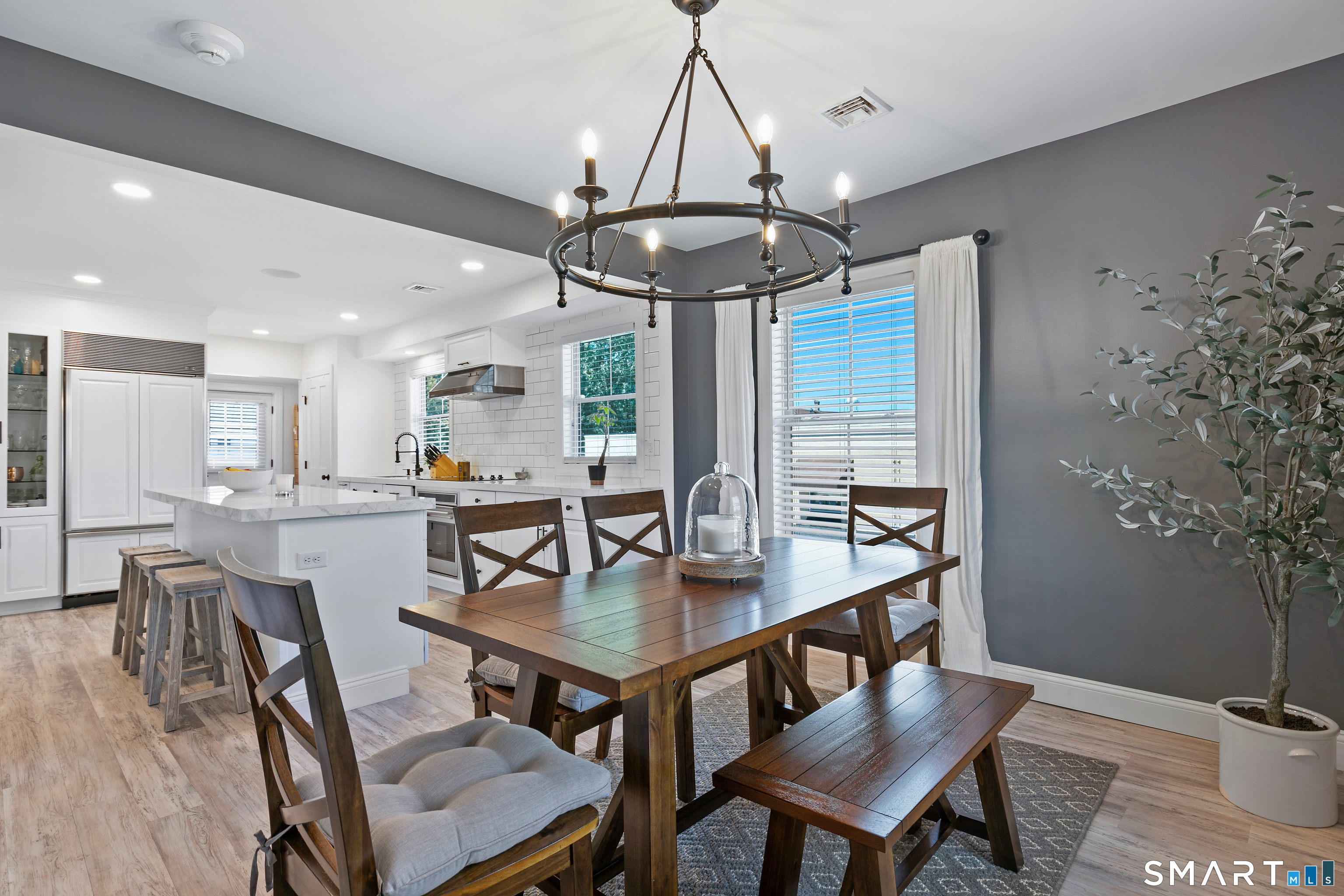 44 Williams Avenue Stonington, CT 06355 - Photo 28 of 39 a view of a dining room with furniture window and wooden floor