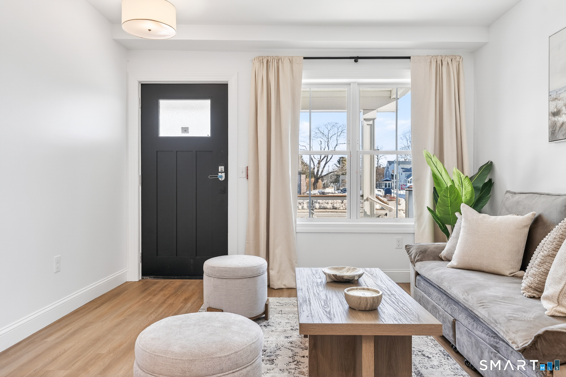 44 Williams Avenue Stonington, CT 06355 - Photo 35 of 39 a living room with furniture and wooden floor