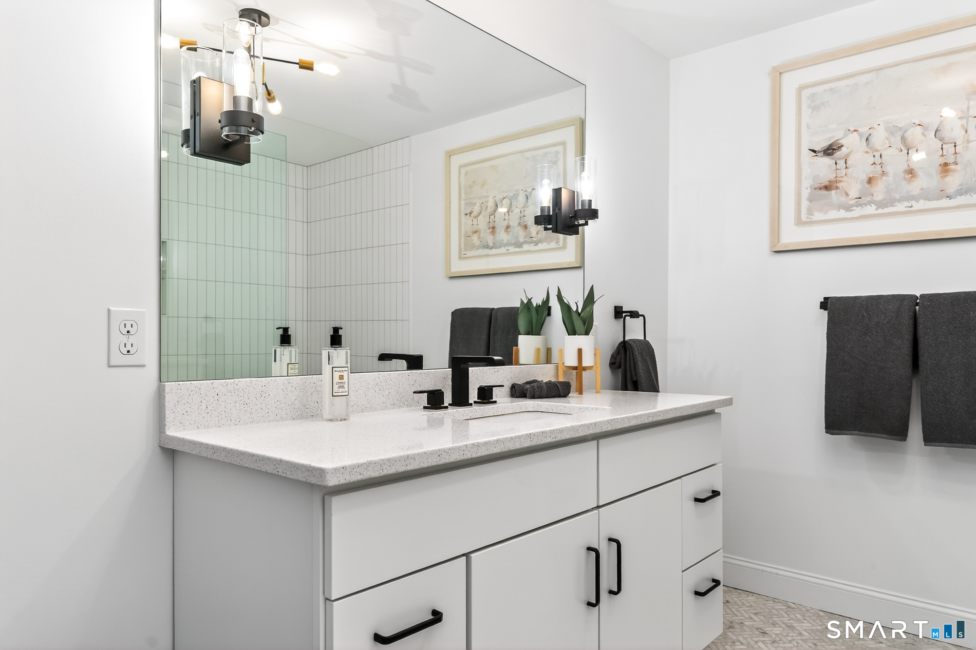 44 Williams Avenue Stonington, CT 06355 - Photo 38 of 39 a bathroom with a sink and a mirror