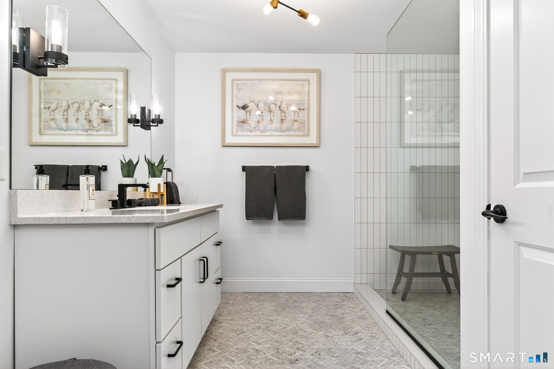 44 Williams Avenue Stonington, CT 06355 - Photo 39 of 39 a bathroom with a sink a mirror and a shower