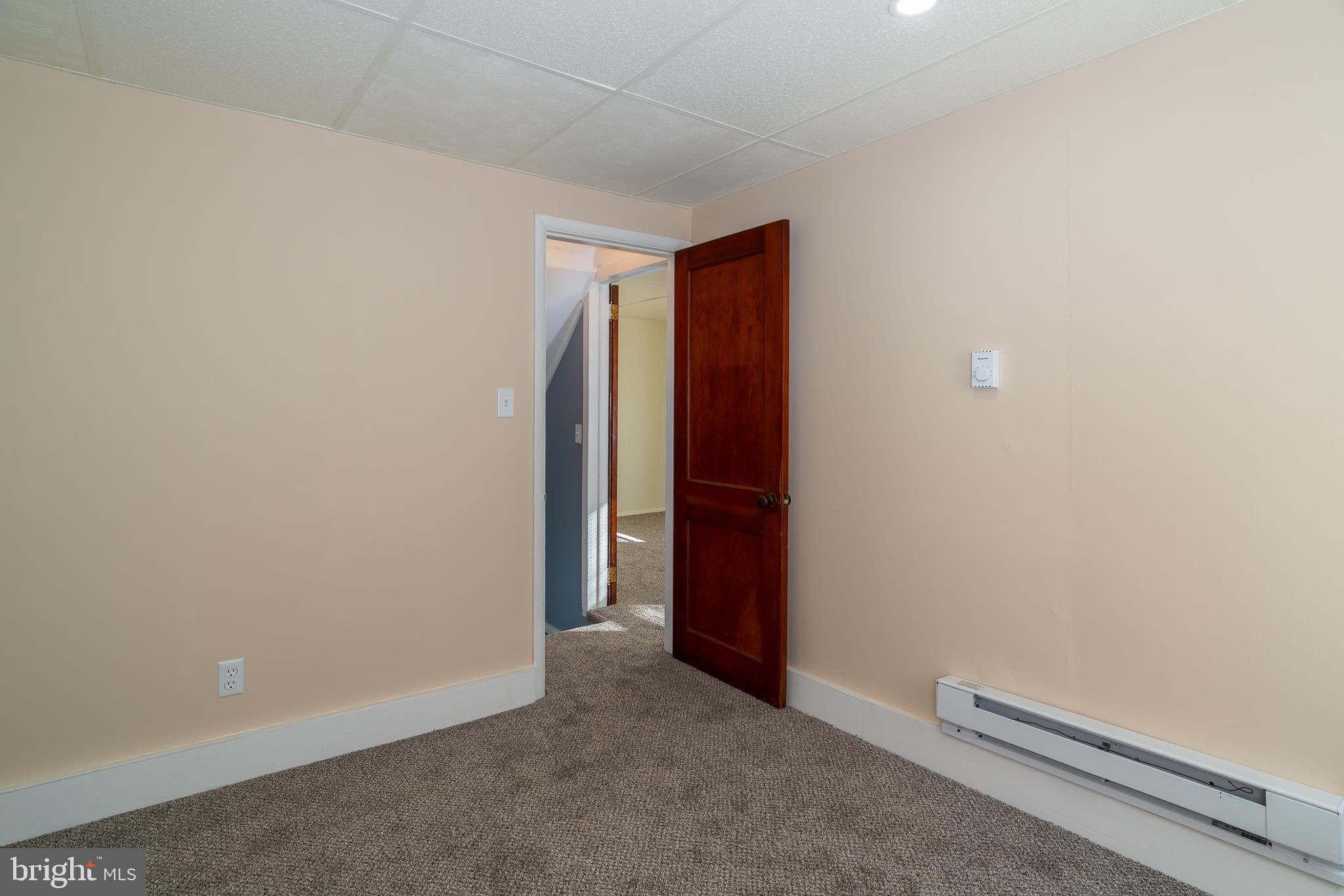 1230 Reading Road Denver, PA 17517 - Photo 22 of 36 an empty room with an entryway