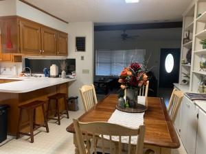 2232 Private Road 4032 Road Eden, TX 76837 - Photo 15 of 40 a dining room with furniture and wooden floor