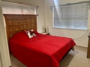 2232 Private Road 4032 Road Eden, TX 76837 - Photo 22 of 40 a bed sitting in a bedroom next to a window