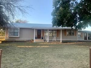 2232 Private Road 4032 Road Eden, TX 76837 - Photo 24 of 40 a front view of a house with a garden