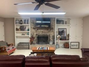 2232 Private Road 4032 Road Eden, TX 76837 - Photo 8 of 40 a living room with furniture and a fireplace