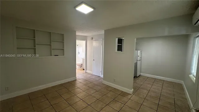 a bathroom with a light fixture and a light fixture