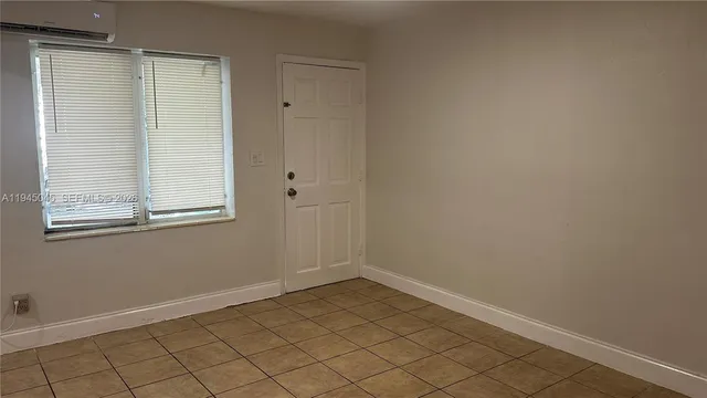 a view of a room with windows