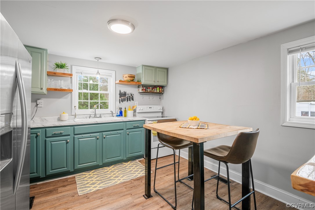 12901 Ruth Hill Road Church Road, VA 23833 - Photo 21 of 50 a kitchen with a table and chairs in it