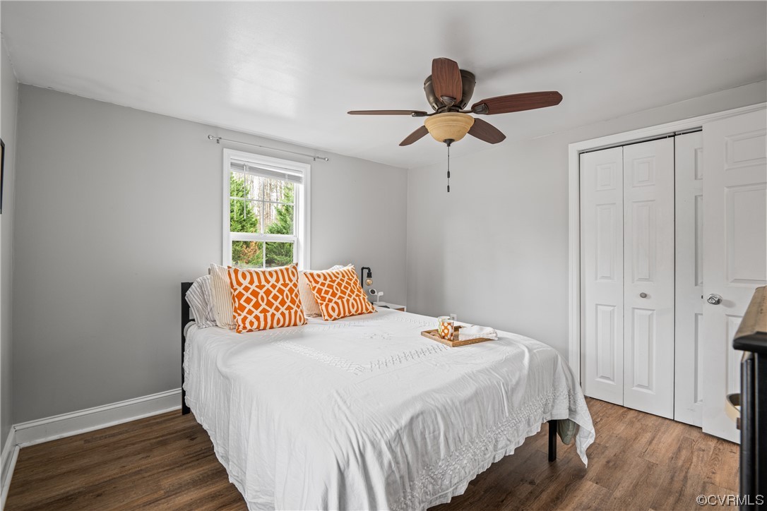 12901 Ruth Hill Road Church Road, VA 23833 - Photo 31 of 50 a bedroom with a bed and a chandelier
