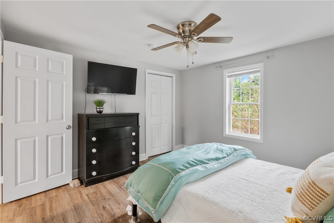 12901 Ruth Hill Road Church Road, VA 23833 - Photo 34 of 50 a bedroom with a bed and a flat screen tv