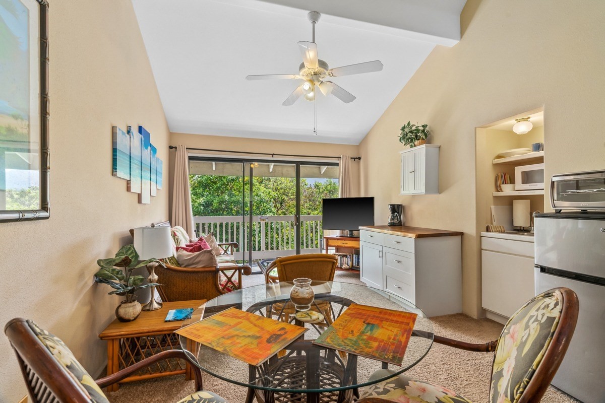 5301 Ka Haku Road, Unit 208 Princeville, HI 96722 - Photo 23 of 27 a work room with furniture water view and large windows