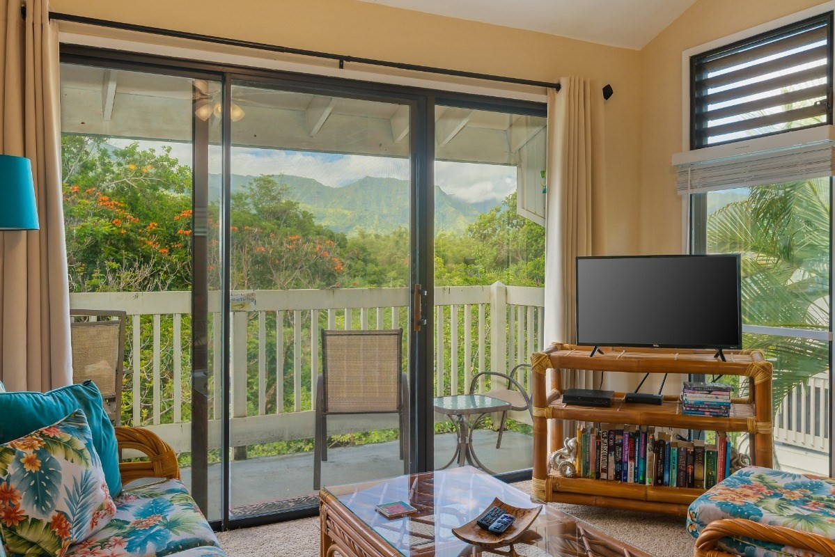 5301 Ka Haku Road, Unit 208 Princeville, HI 96722 - Photo 3 of 27 a room with furniture and a flat screen tv