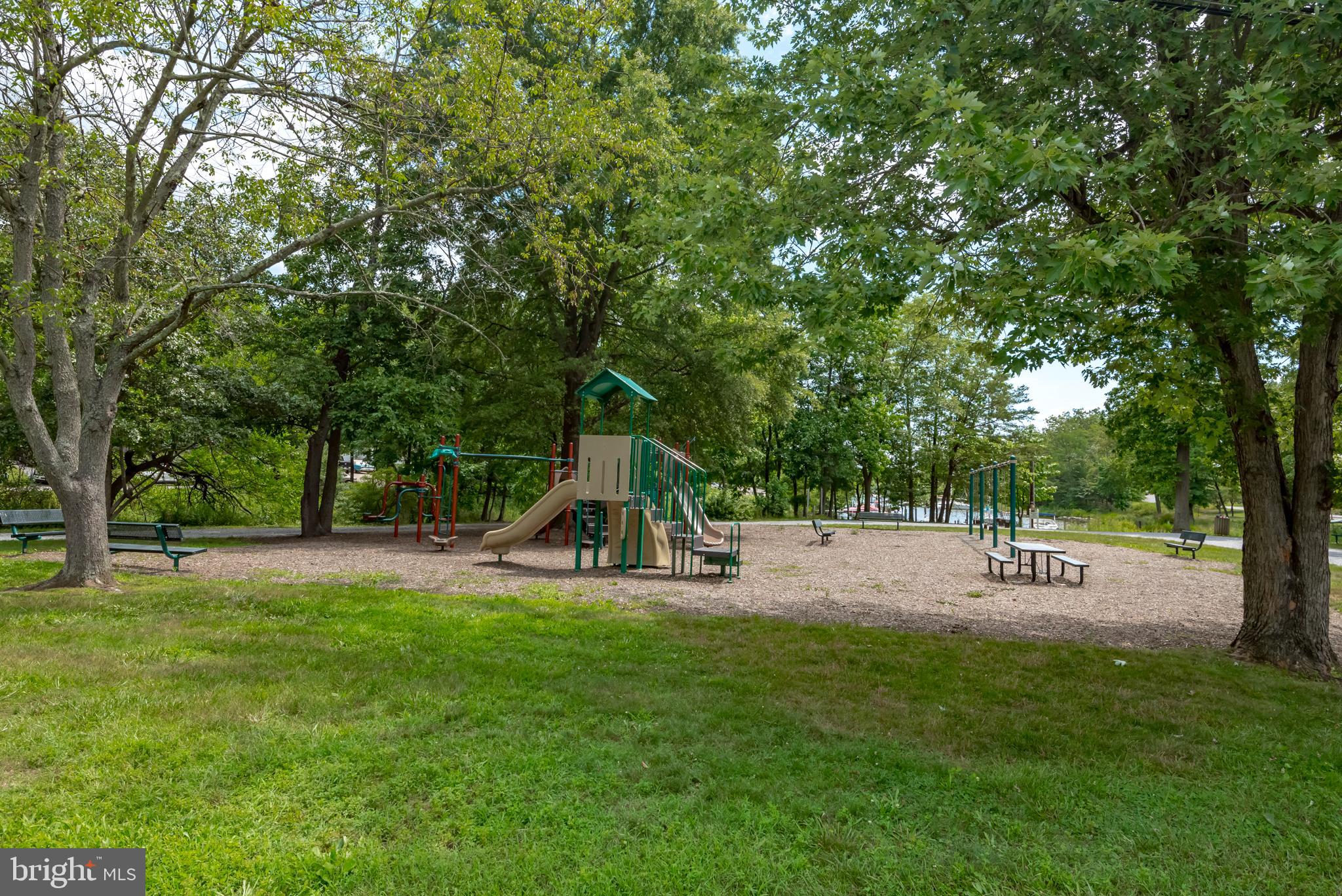 534 Londontown Road Edgewater, MD 21037 - Photo 57 of 59 a view of a park with swings and slides