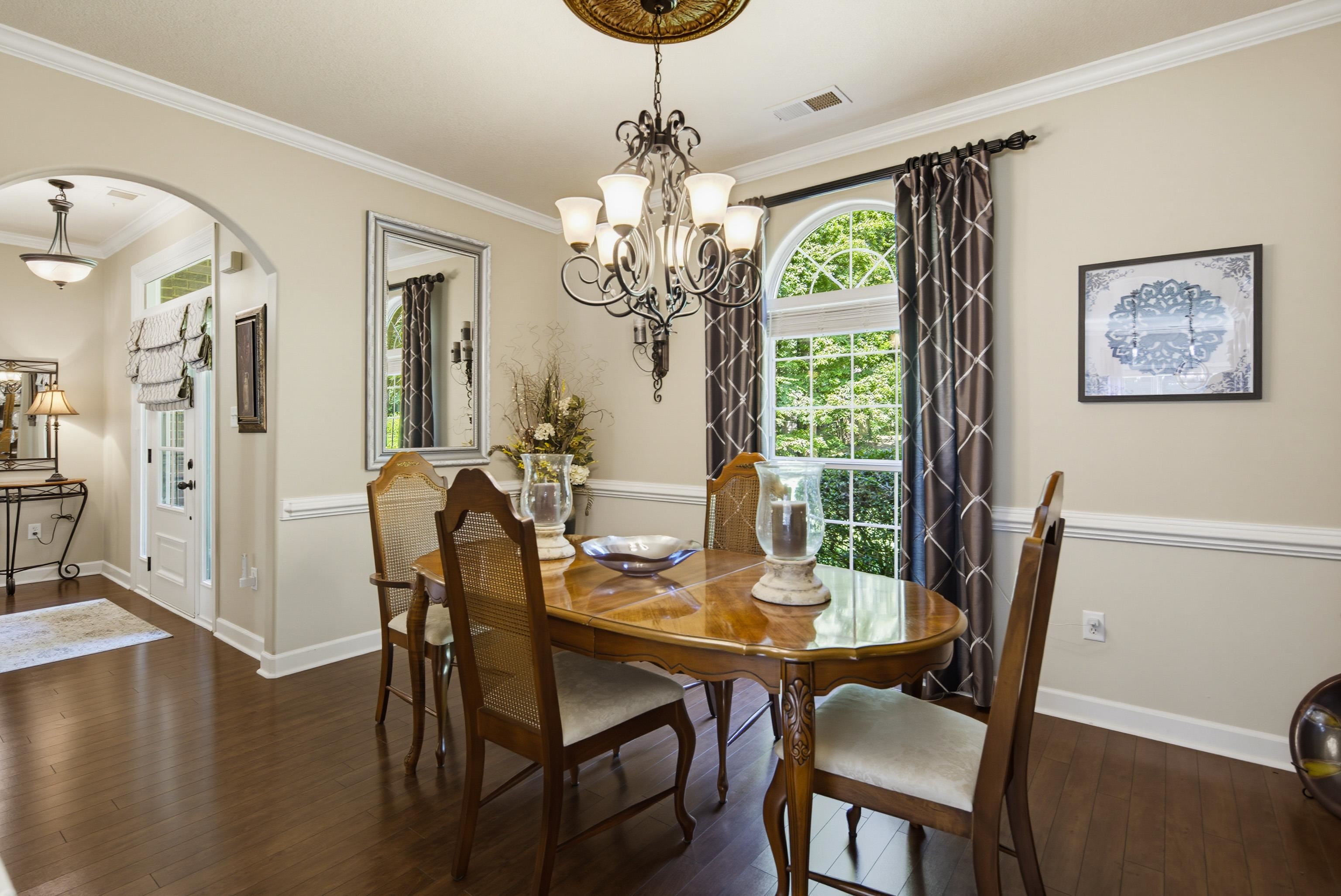 243 Hayes Road Munford, TN 38058 - Photo 12 of 25 Formal dining area featuring rich wood-finish flooring off the front entry and kitchen making it great for entertaining guests