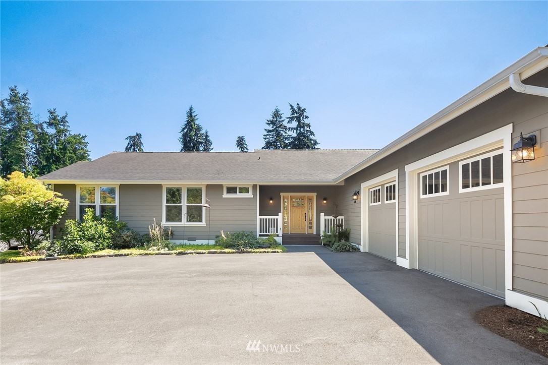 4726 166th Place Southeast Bothell, WA 98012 - Photo 3 of 34 front view of a house with a yard