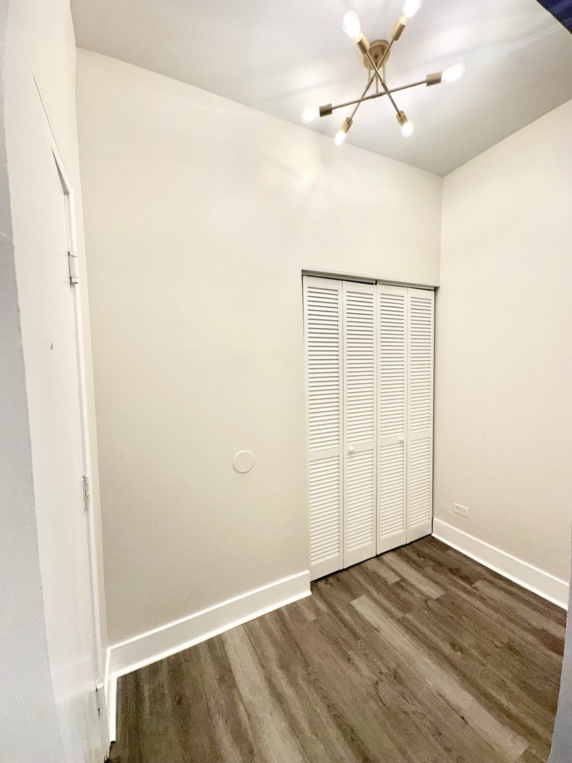 3008 West 23rd Street, Unit 2B Chicago, IL 60623 - Photo 8 of 10 a view of an empty room