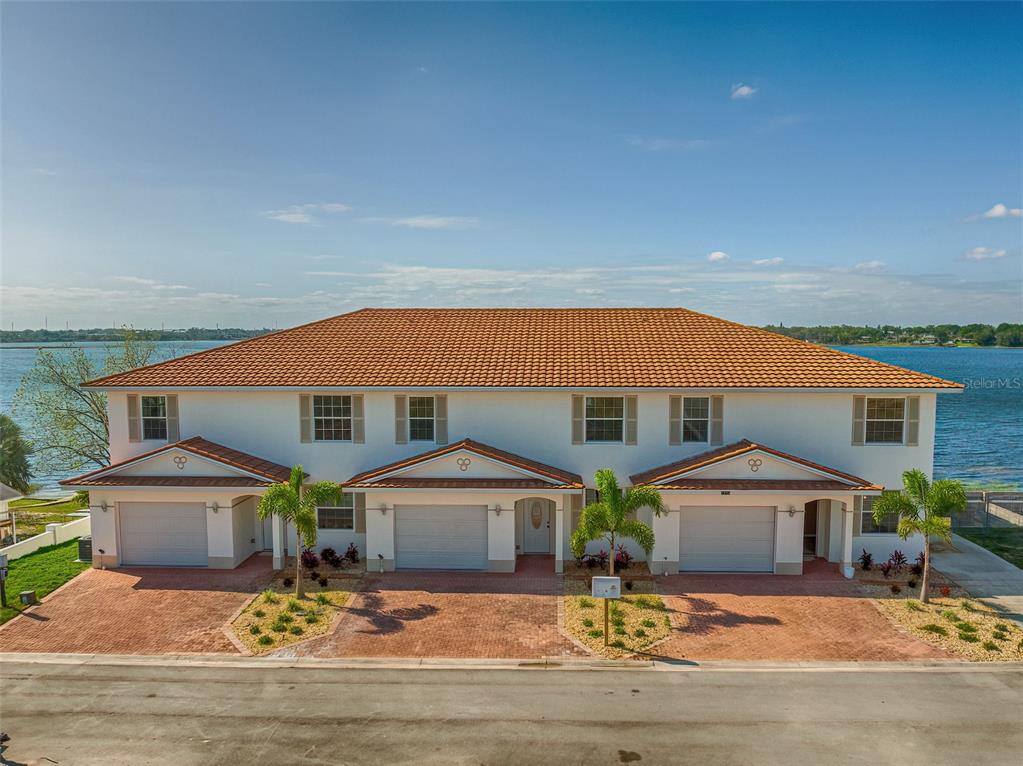1877 Arbuckle Creek Road Sebring, FL 33870 - Photo 12 of 50 a front view of house with yard outdoor seating and garage