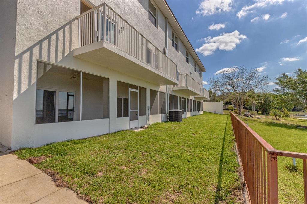 1877 Arbuckle Creek Road Sebring, FL 33870 - Photo 16 of 50 a view of a house with a yard